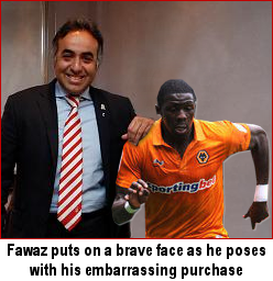 Fawaz puts on a brave face as he poses with his embarrassing purchase